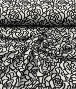 Tissu jacquard tricoté roses noir et blanc