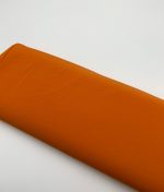 Tissu Bi-stretch Milano orange poussiéreux