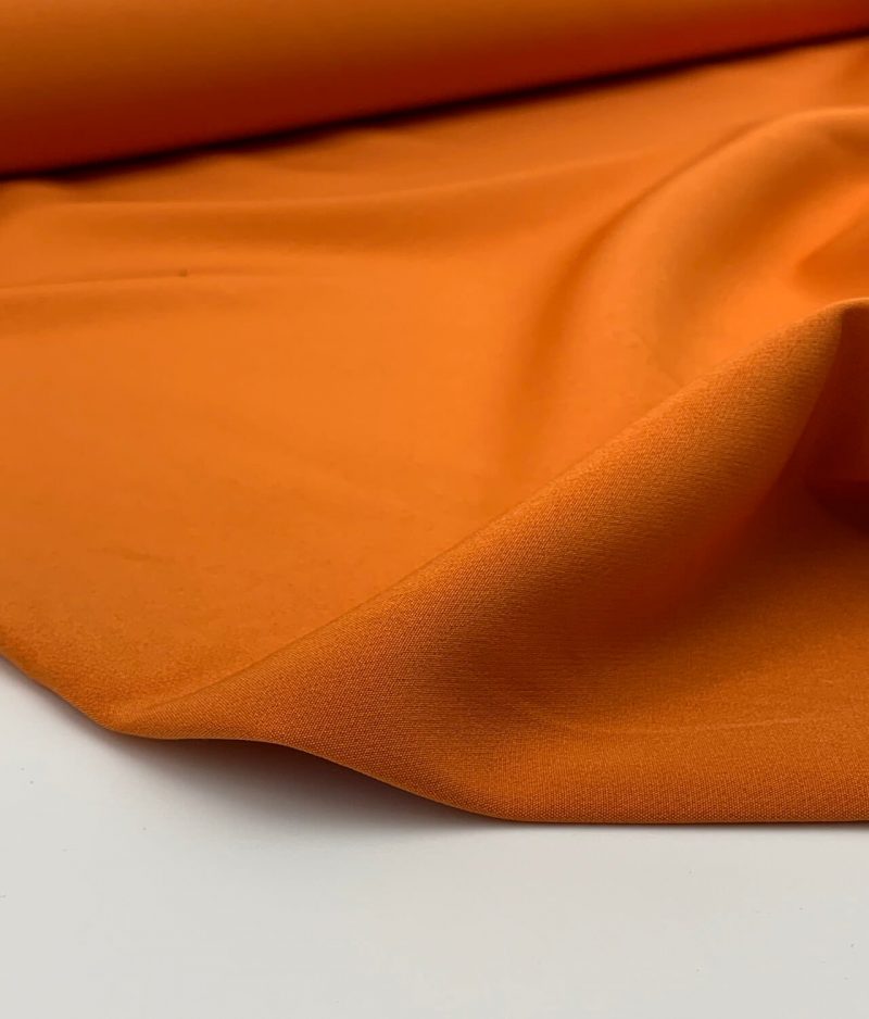 Tissu Bi-stretch Milano orange poussiéreux